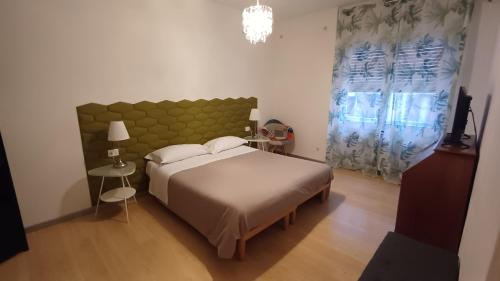 เตียงในห้องที่ Residence Sole