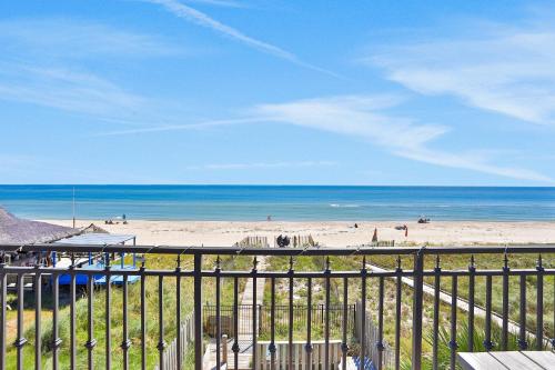 a view of the beach from a balcony at Beachfront home with pool elevator dog-friendly in St. George Island
