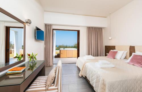 En eller flere senge i et værelse på White Oak Tree Villa
