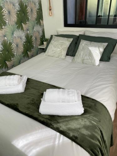 Llit o llits en una habitació de L'escapade