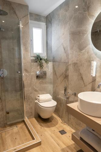 Vonios kambarys apgyvendinimo įstaigoje Oniro Suites Level 4
