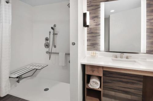 a bathroom with a sink and a mirror at Homewood Suites by Hilton Providence Downtown in Providence