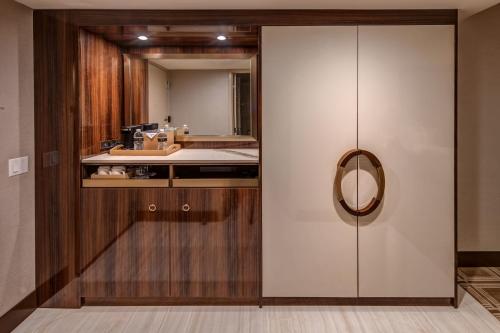 a bathroom with a sink and a mirror at Grand Sierra Resort and Casino in Reno