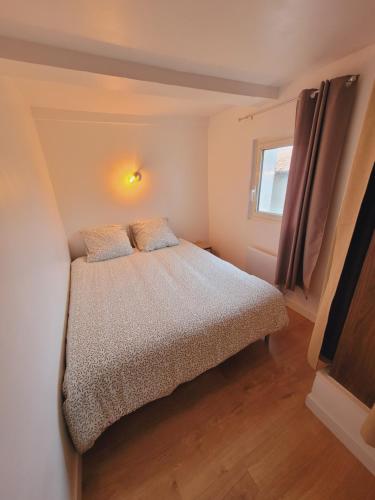 Llit o llits en una habitació de Appartement de Florian