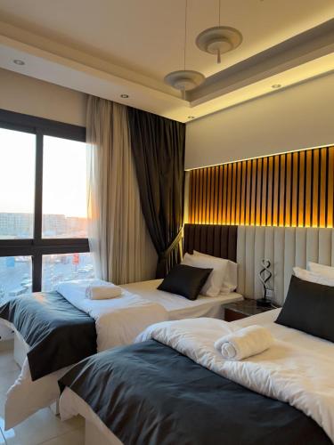 Stylish Duplex in Park Mall - Free Pool - By Guave Stay