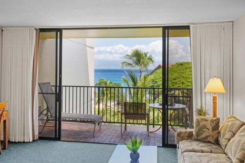 a living room with a view of the ocean at Kaanapali Shores 512 in Kaanapali