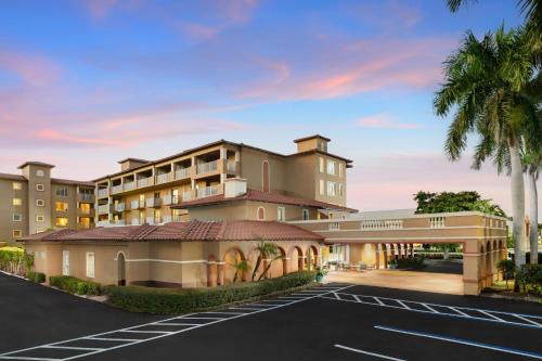 a rendering of a hotel with a parking lot at Inn of Naples, Tapestry Collection by Hilton in Naples