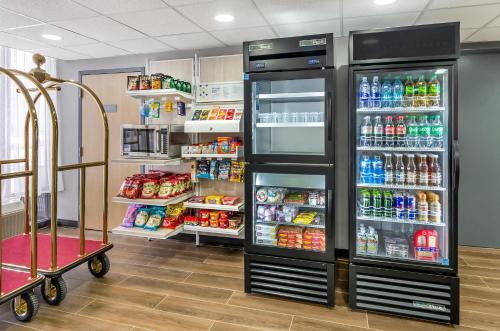a store with an open refrigerator filled with drinks at Spark By Hilton Roanoke Airport in Roanoke