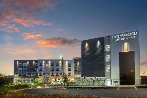 a rendering of a hotel with a building at Homewood Suites By Hilton Austin Airport in Austin