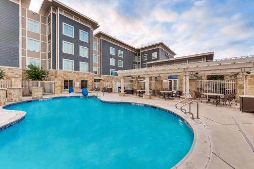 an image of a swimming pool at a hotel at Homewood Suites by Hilton Fort Worth Medical Center in Fort Worth