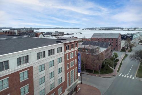 an aerial view of a city with buildings and a river at Hampton Inn Portland Downtown Waterfront in Portland