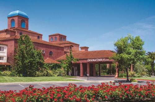 a red brick building with a tower on top at DoubleTree by Hilton Sonoma Wine Country in Rohnert Park