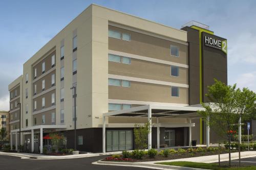 a large building with a hotel sign on it at Home2 Suites by Hilton Arundel Mills BWI Airport in Hanover