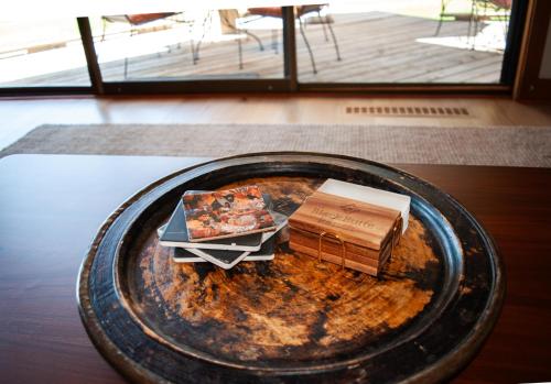 a plate with two boxes on top of a table at Lodge Condo 014 in Black Butte Ranch