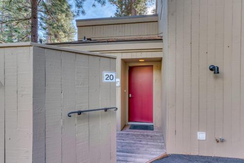 a red door on the side of a building at Lodge Room 020 in Black Butte Ranch