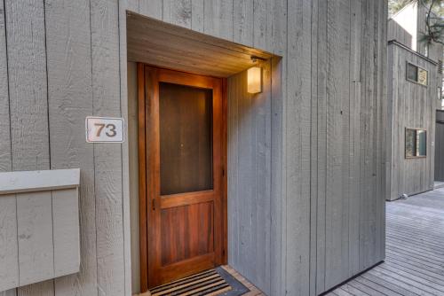 a wooden door on the side of a building at Country House 073 in Black Butte Ranch