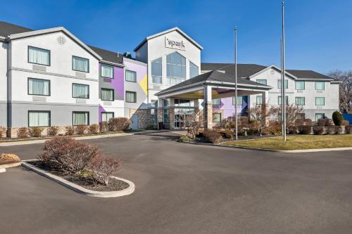a rendering of a hotel with a parking lot at Spark by Hilton Salt Lake City Central in Salt Lake City