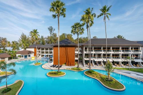 an image of a resort with a large pool at Amora Beach Resort Phuket in Bang Tao Beach