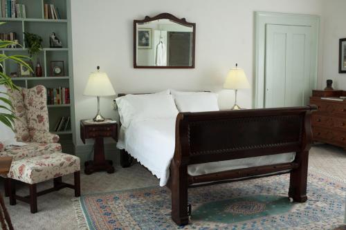 Ένα ή περισσότερα κρεβάτια σε δωμάτιο στο The Denny House
