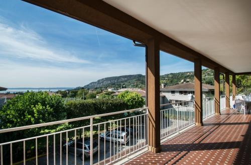 a view from the balcony of a house at Residence Villa Rosa in Garda