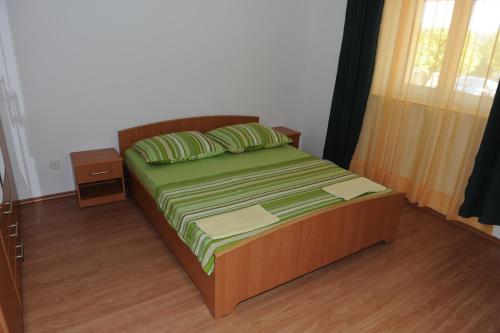 Postel nebo postele na pokoji v ubytování Apartment Matini Dvori