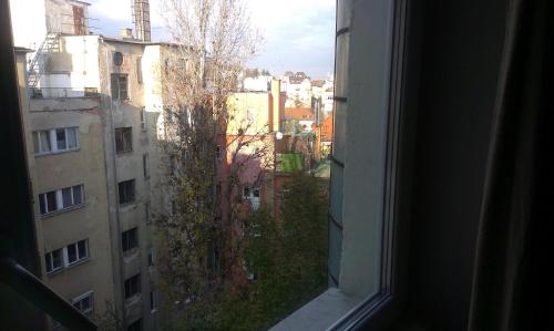 a view of a city from a window at Budanest Apartments in Budapest