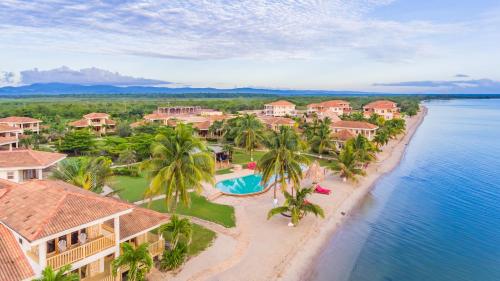 an aerial view of the resort and the beach at Hopkins Bay Belize a Muy'Ono Resort in Hopkins