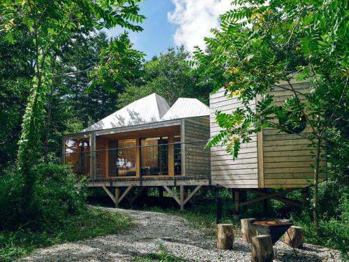 a house in the middle of a forest at SANU 2nd Home 河口湖2nd in Fujikawaguchiko