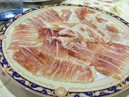 a plate of food sitting on a table at Hospedería Ana Pilar in Porcuna