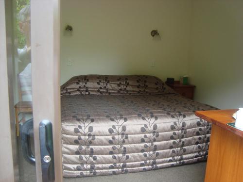 a bedroom with a bed in a room at Warkworth Country House in Warkworth