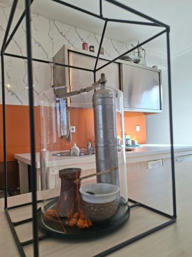 a glass stand with a blender in a kitchen at Villa Sabic - Free Garage & Panoramic View in Sarajevo