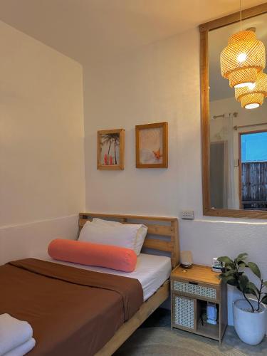 Llit o llits en una habitació de Akap Guyam