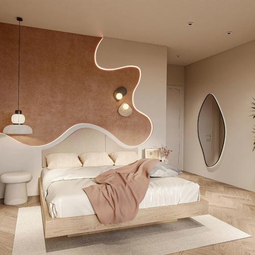 a bedroom with a white bed with a wooden headboard at GÓC MƠ home in Da Thanh