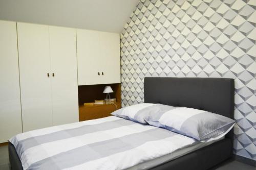 Postel nebo postele na pokoji v ubytování Apartamenty 66 c