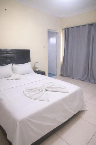 Katil atau katil-katil dalam bilik di Vaidosa Guesthouse