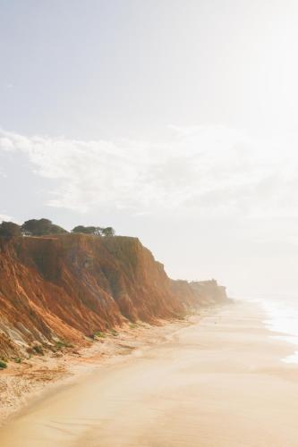 a view of a beach with a cliff at Falésia Hotel - Adults Only in Albufeira