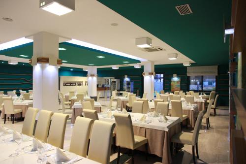 En restaurant eller et andet spisested på Fontanarosa Residence