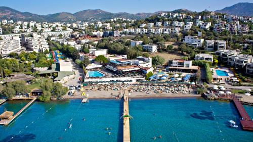 an aerial view of a city with a body of water at Cactus Fleur Beach in Yalıkavak
