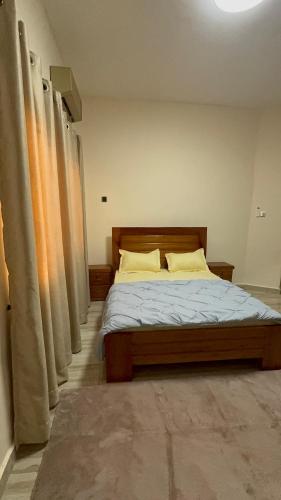 Llit o llits en una habitació de Cozy Home