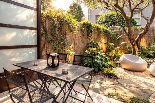 Isola Green Oasis - Loft with Garden & Free private Garage