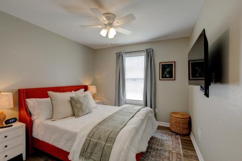 a bedroom with a bed and a ceiling fan at Mimosa Getaway - Thomasville Fun! in Thomasville