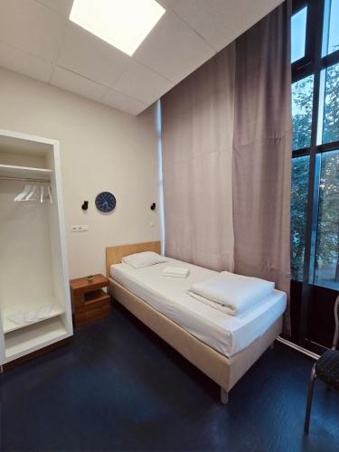 Llit o llits en una habitació de THH Apartments