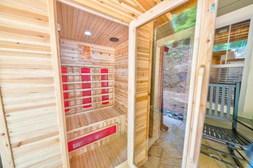 a sauna in a house with wooden walls at Break Time - Modern 5BR with hot tub, game room, air hockey and resort pool in Gatlinburg