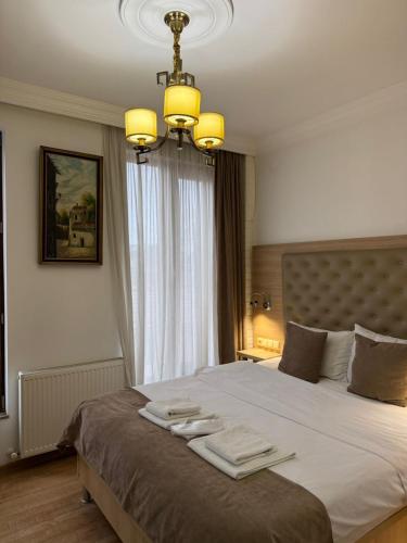เตียงในห้องที่ Hotel Varios