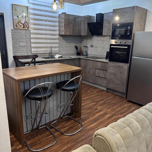 Кухня або міні-кухня у DUPLEX 2 bedrooms