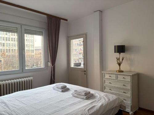 Llit o llits en una habitació de Star apartment