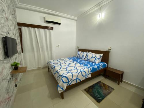 Llit o llits en una habitació de Résidence meublée