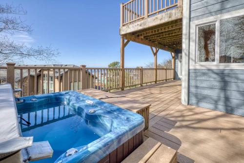 a hot tub on the deck of a house at Annie's Windsong in Lincoln City