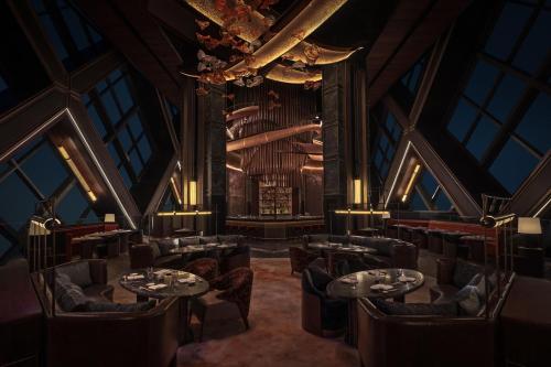 a rendering of a restaurant with tables and chairs at SIRO One Za'abeel in Dubai