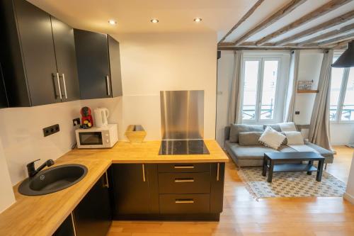 Grand studio loft bien equipe a Paris 15 - 2P
